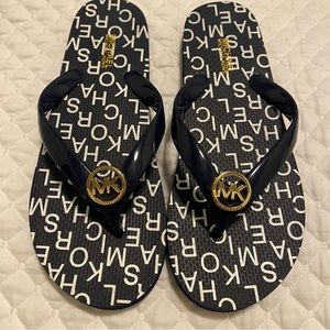 Michael Kors blue flip flops, size 7